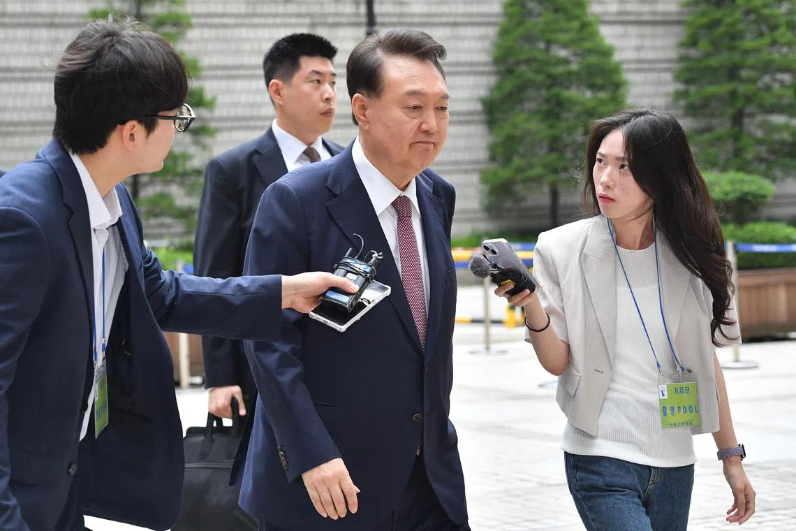 A special council questioned former South Korean president Yoon Suk Yoon (centre) on Saturday over his resistance during a failed arrest attempt in January, as well as allegations that he authorised drones to fly to Pyongyang as a justification for declaring martial law.