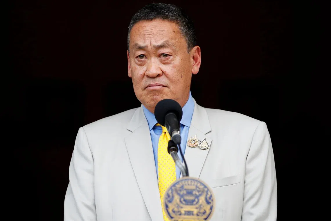 Srettha Thavisin speaks to the media after he was dismissed from his post for breaching ethical rules.