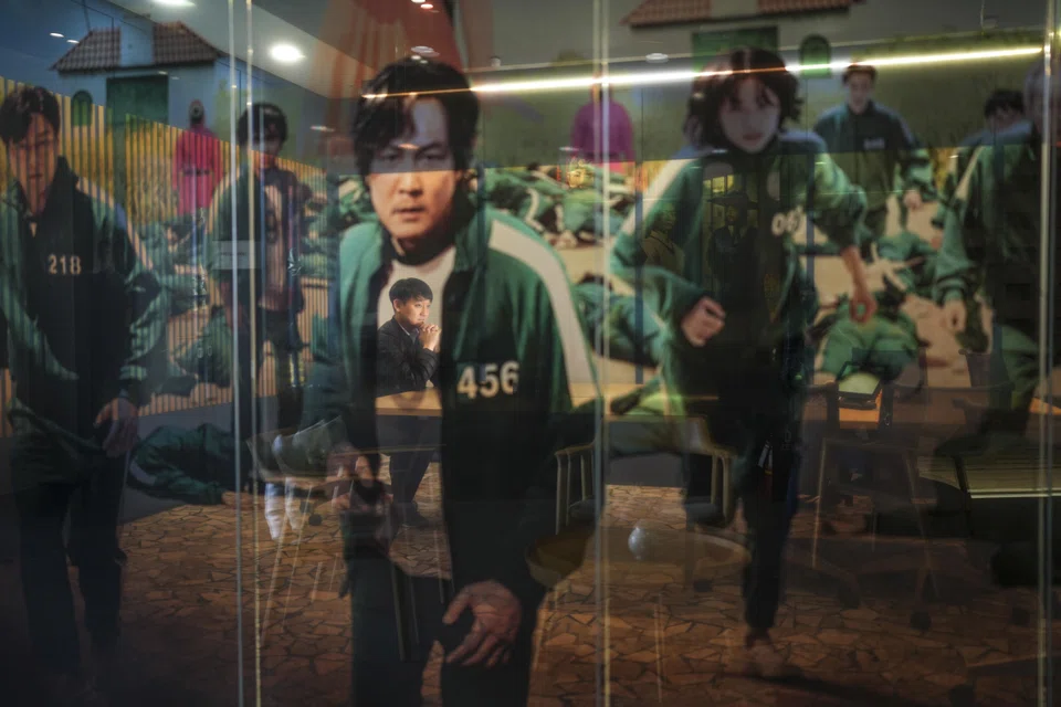 Don Kang, Netflix's vice-president of content in South Korea, is seen through a window at the company office in Seoul. 