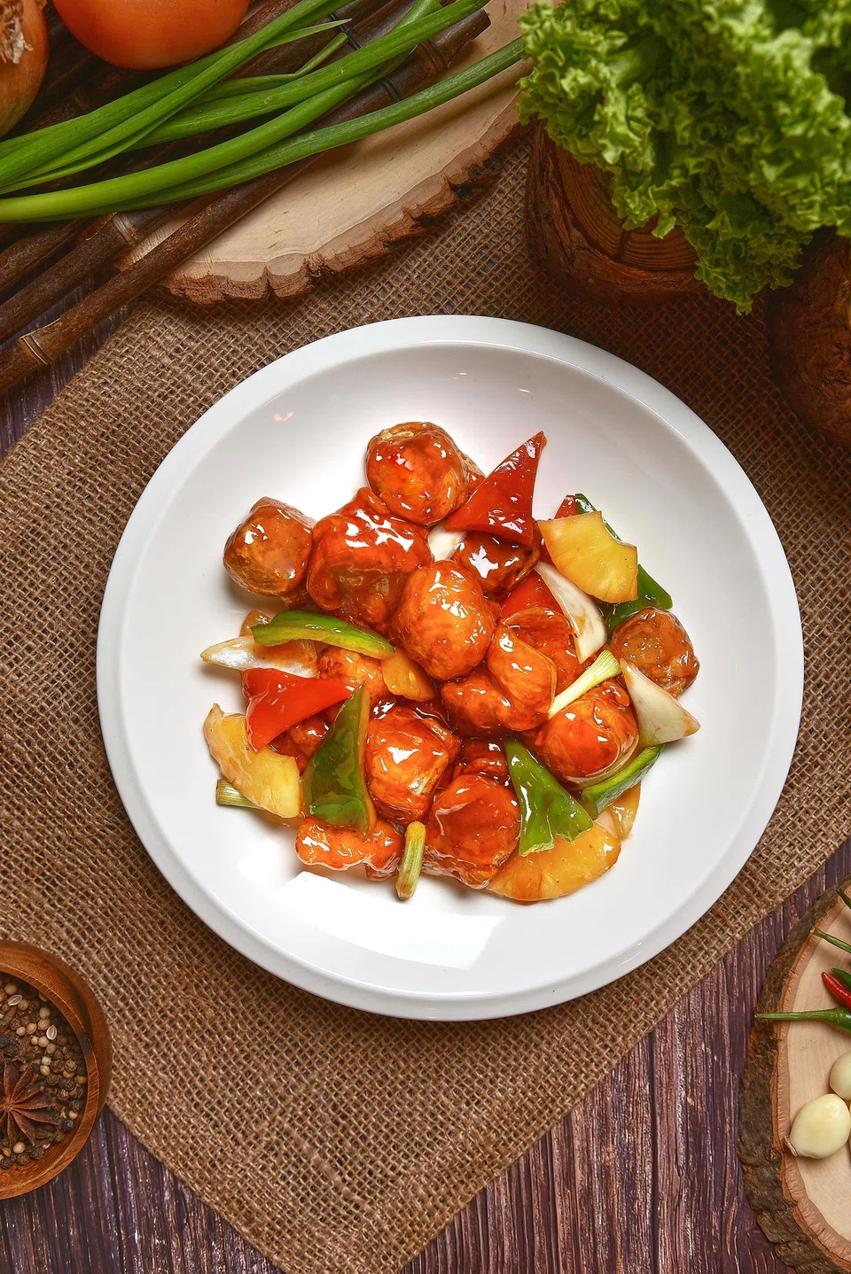 Sweet and sour pork features deep-fried juicy pork in a sticky sweet sauce.