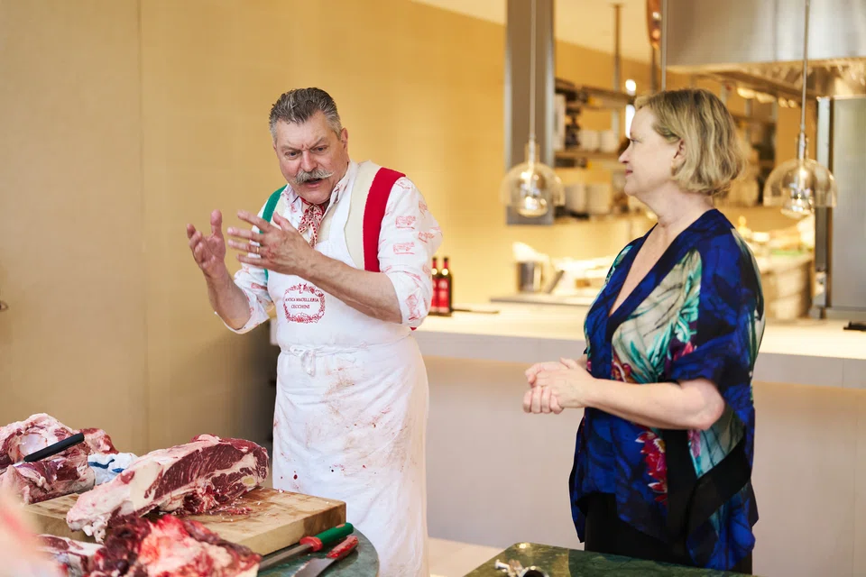  Cecchini and his American-born wife Kim Wicks at a meat carving demonstration.                              
