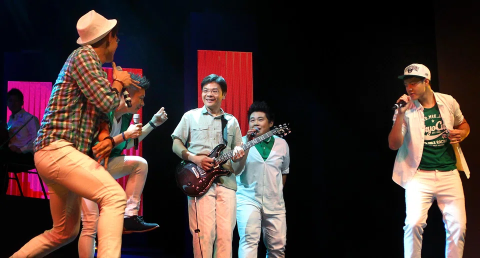 Prime Minister Lawrence Wong – then the acting minister for culture, community and youth – surprised the audience at the ChildAid 2012 charity concert with an impromptu performance. 