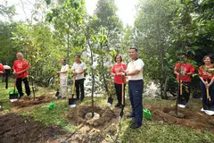 From left: Professor Leo Tan, chairman of Garden City Fund; Kenneth Er, chief executive of NParks; Helen Wong, group CEO of OCBC; and Desmond Lee, Minister for National Development & Minister-in-charge of Social Services Integration at Sungei Durian on Pulau Ubin.
