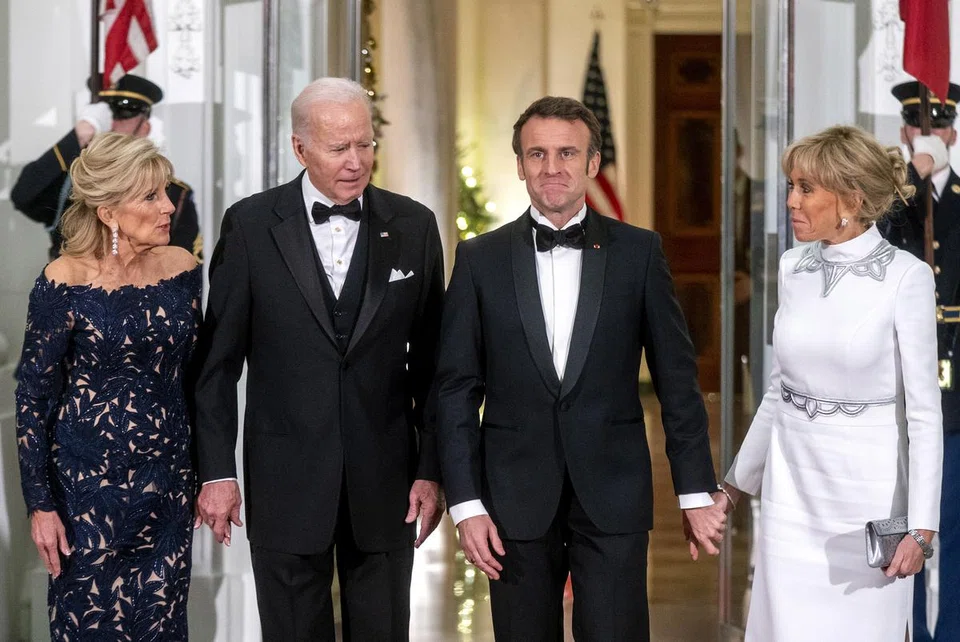 US President Joe Biden and First Lady Jill Biden greet French President Emmanuel Macron and his wife Brigitte Macron before the state dinner at the North Portico of the White House in Washington, DC, US, 01 December 2022. Macron's visit marks the first official state visit of the Biden administration.  