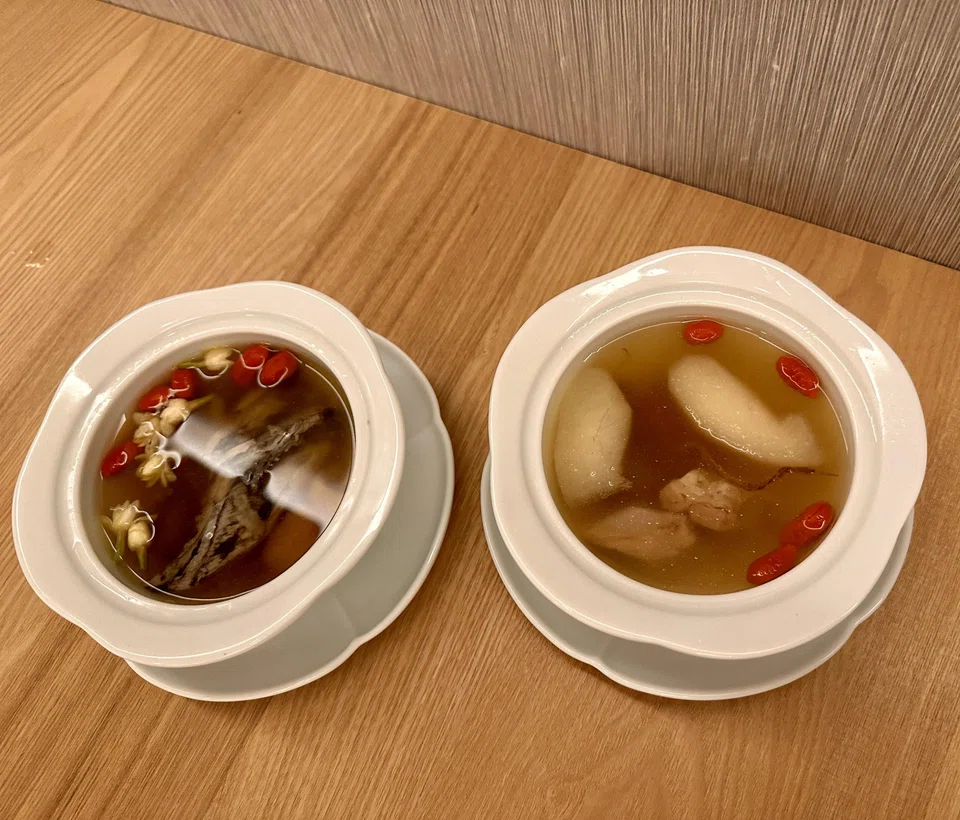Heartwarming double-boiled silkie chicken soup (left) and superior stock with snow pear.