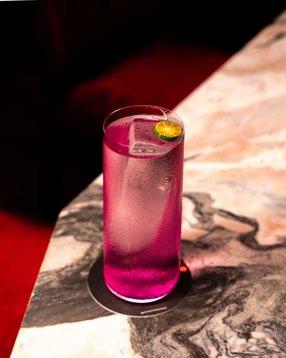 Imagine Dragon, a highball crafted around the vivid red tones of dragonfruit, achieves a delicate balance with its diverse blend of ingredients.