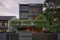 Breezeblocks separate the car porch from the courtyard.