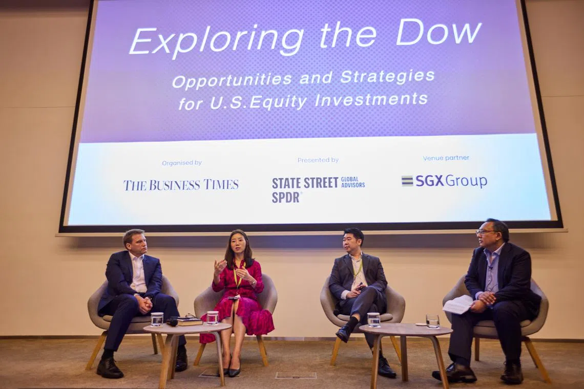 From left: Geoff Howie, market strategist, Singapore Exchange; Sue Lee, director and Asia-Pacific head of index investment strategy, S&P Dow Jones Indices; Jermyn Wong, head of intermediary, South-east Asia, State Street Global Advisors; and Ben Paul, senior correspondent, The Business Times. They were speaking on a panel titled “Exploring the Dow: Opportunities and strategies for US equities investments” on Nov 9.