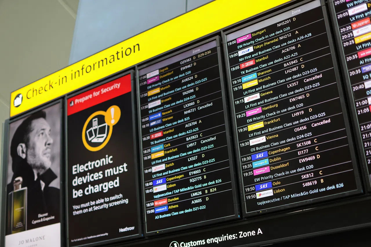 A check-in information board displays details on cancelled flights after radar failure led to the suspension of outbound flights across the UK, at Heathrow Airport, London, Britain, July 30, 2025. 