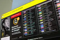 A check-in information board displays details on cancelled flights after radar failure led to the suspension of outbound flights across the UK, at Heathrow Airport, London, Britain, July 30, 2025. 