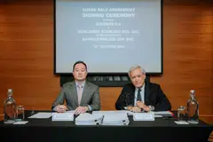 Worldwide Stainless CEO Danny Tan (left) and Acerinox general counsel and board secretary Luis Gimeno, at the share sale agreement signing ceremony.