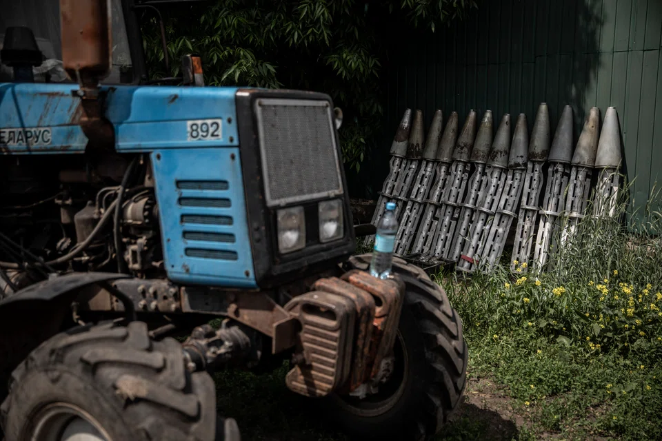 Remnants of cluster munitions that Oleksandr Chaplik has found on his farmland near Sievierodonetsk, Ukraine, where Russian and Ukrainian troops have been battling for control in heavy street fighting in recent days, June 1, 2022. The countryside around his farm is under almost constant bombardment by Russian forces trying to encircle the easternmost Ukrainian forces. (Finbarr O'Reilly/The New York Times)