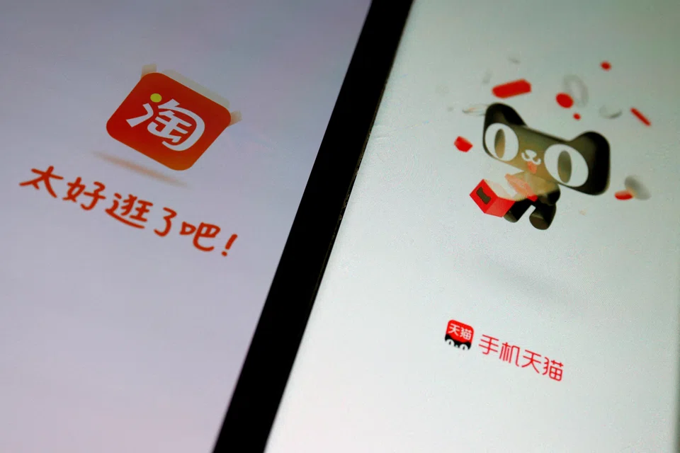 Alibaba's e-commerce apps Taobao and Tmall displayed on mobile phones, Oct 27, 2023. Last year Alibaba’s platforms, as well as JD.com pledged billions of yuan to subsidise discounts and coupons across regular sales events.