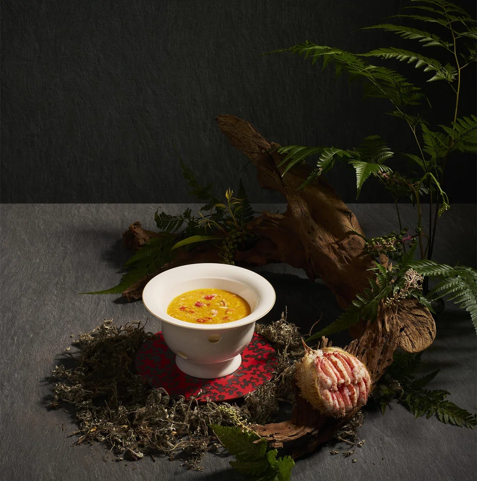 Rich foie gras chawanmushi lies under a thickened crab roe soup.