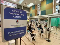 People waiting in the observation zone at a vaccination centre in November 2021. The Ministry of Health surged vulnerable people to get boosters and be cautious in “settings with many potential contacts”.