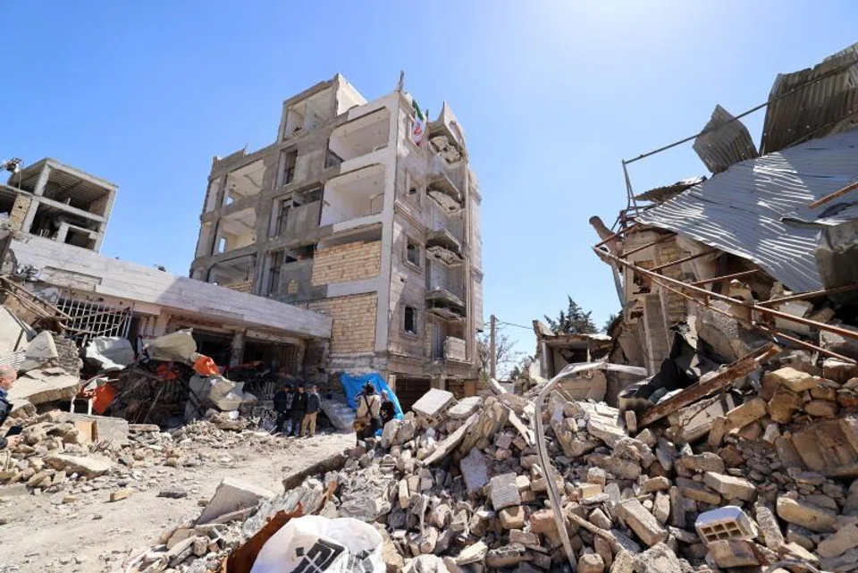 Damaged residential buildings in Karaj, Iran, after an airstrike. The country's foreign minister says attacks on civilian structures “will not compel Iranians to surrender”. 