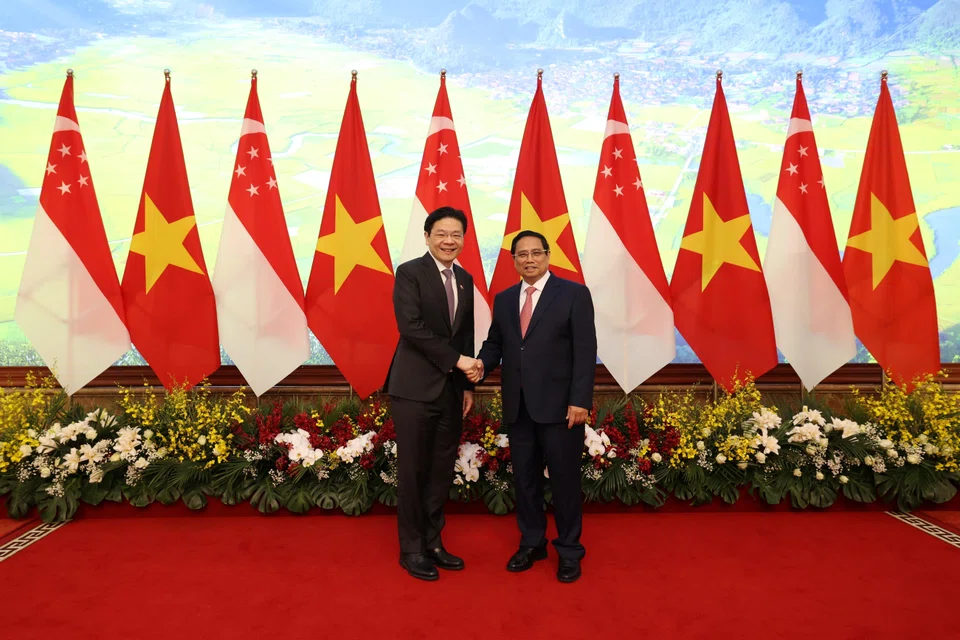 Singapore Prime Minister Lawrence Wong (left) and Vietnam Prime Minister Pham Minh Chinh. PM Wong highlighted the “steady flow” of people moving between the two countries for tourism, work and studies.