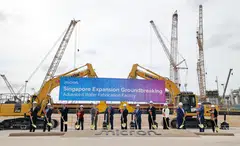 DPM Gan Kim Yong (seventh from left) says R&D and advanced manufacturing, among others, will further reinforce Singapore’s position as a semiconductor hub.