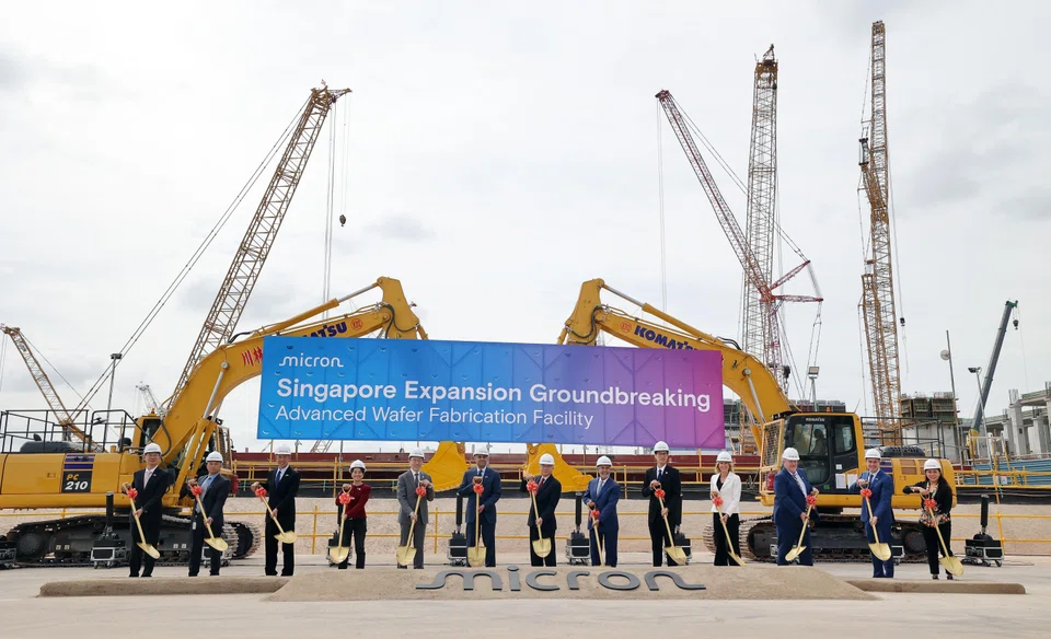 Deputy Prime Minister and Minister for Trade and Industry Gan Kim Yong (seventh from left) says that research and development and advanced manufacturing, among others, will further reinforce Singapore’s position as a semiconductor hub.