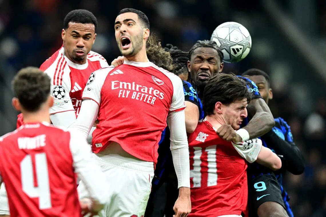 Arsenal (in red) in action against Inter Milan in the Champions League this week. The Gunners won the match 3-1.