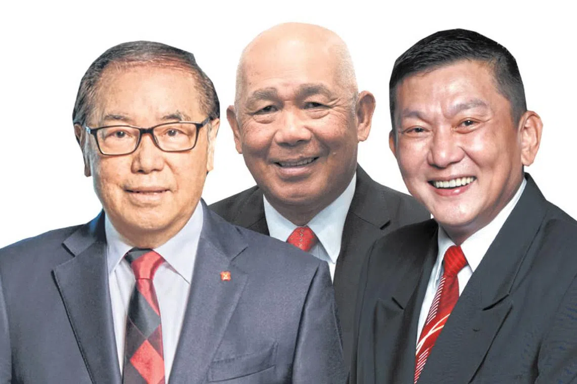 DBS chairman Peter Seah (left), SBS Transit chairman Bob Tan (centre) and Qian Hu's executive chairman Kenny Yap (right)