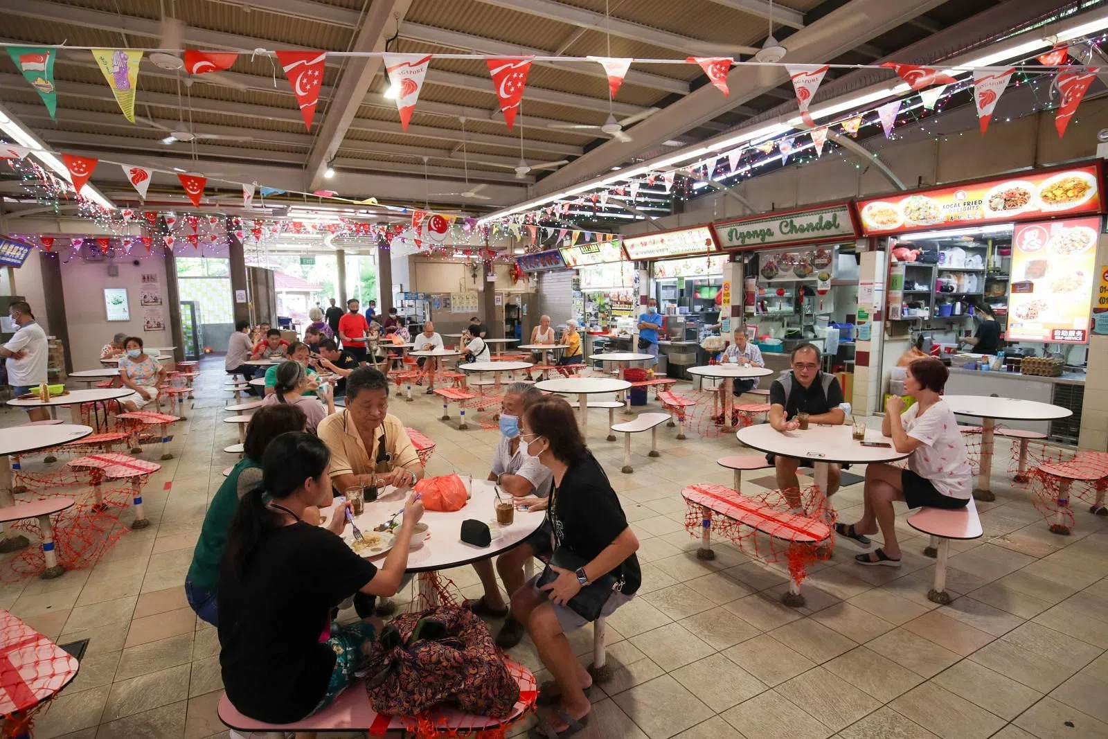 11 hawker centres to allow groups of 5 from different households to
