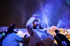 Park visitors enjoying Disney-themed Christmas decorations at Shanghai Disneyland. By freeing up time away from classes, the authorities are pulling on a new lever in their quest to get households to spend more, and at little cost to cash-strapped local budgets.