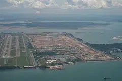 An aerial view of the construction area of Changi Airport Terminal 5. The proposed Changi East Urban District will occupy a 40 ha tract of land – about the size of 56 football fields.