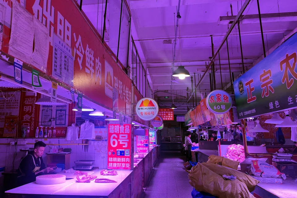 In three markets and a grocery store around Dalian, Chuming signs were displayed prominently where pork was on sale, though labels on packaged meat showed the name of the other entity, in Chinese.