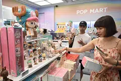 Consumer spending on intellectual property-related goods and services – such as Labubu toys – drives up sales for co-branded products. 