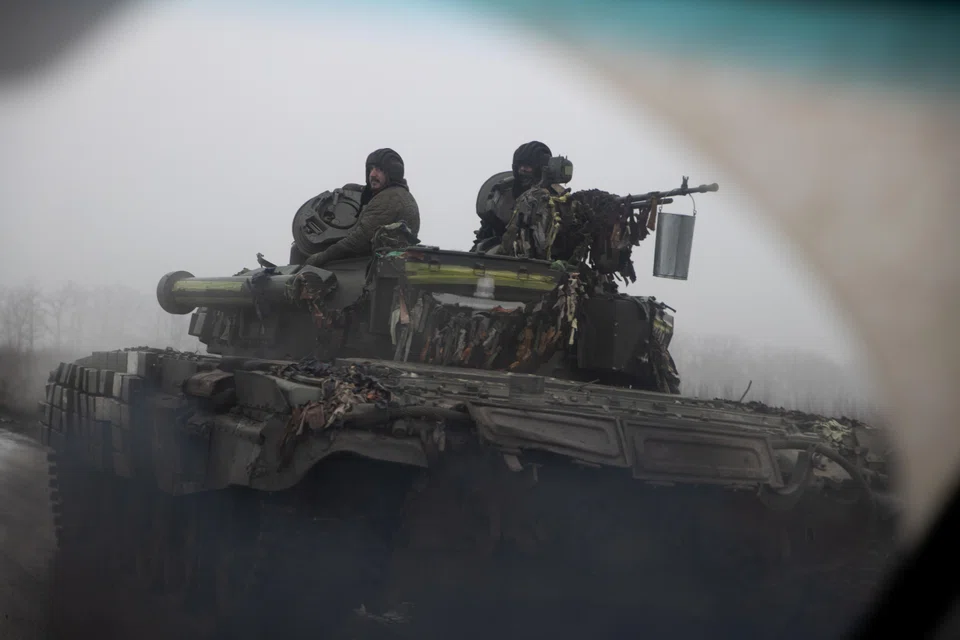 Ukrainian troops in a tank in the Bakhmut district of eastern Ukraine. The West has committed to sending advanced battle tanks to help Ukraine against Russia.