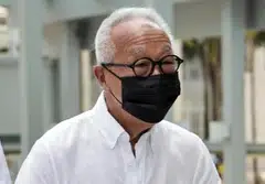 He faces one charge of abetting offences under Section 165 of the Penal Code and one charge of abetting the obstruction of justice.