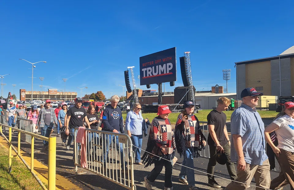 Trump supporters queuing to enter the civic centre, but stand no chance against voters who lined up overnight.