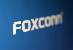 Foxconn says net profit for the April-June quarter slips to NT$33 billion.