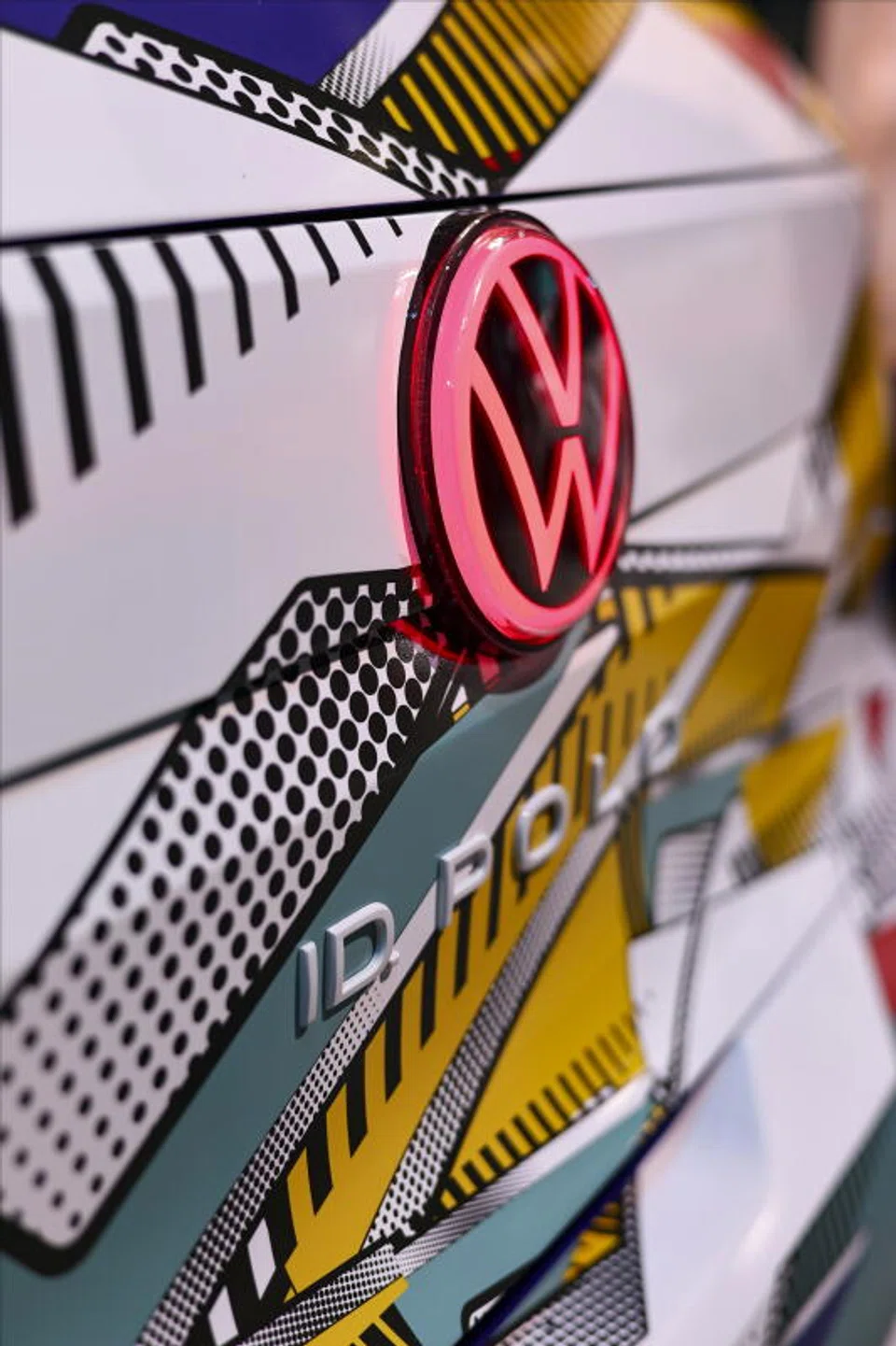 A VW logo on the trunk of an ID.Polo on display at the International Motor Show Germany IAA Mobility 2025 in Munich.