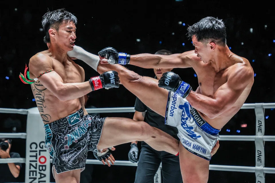 Fighters in action at the weekly One Friday Fights event at the Lumpinee Boxing Stadium in Bangkok.