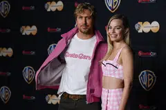 Canadian actor Ryan Gosling and Australian actress Margot Robbie arrive for the Warner Brothers Pictures red carpet photocall of “Barbie” during CinemaCon 2023 in Las Vegas, Nevada, on April 25, 2023. 