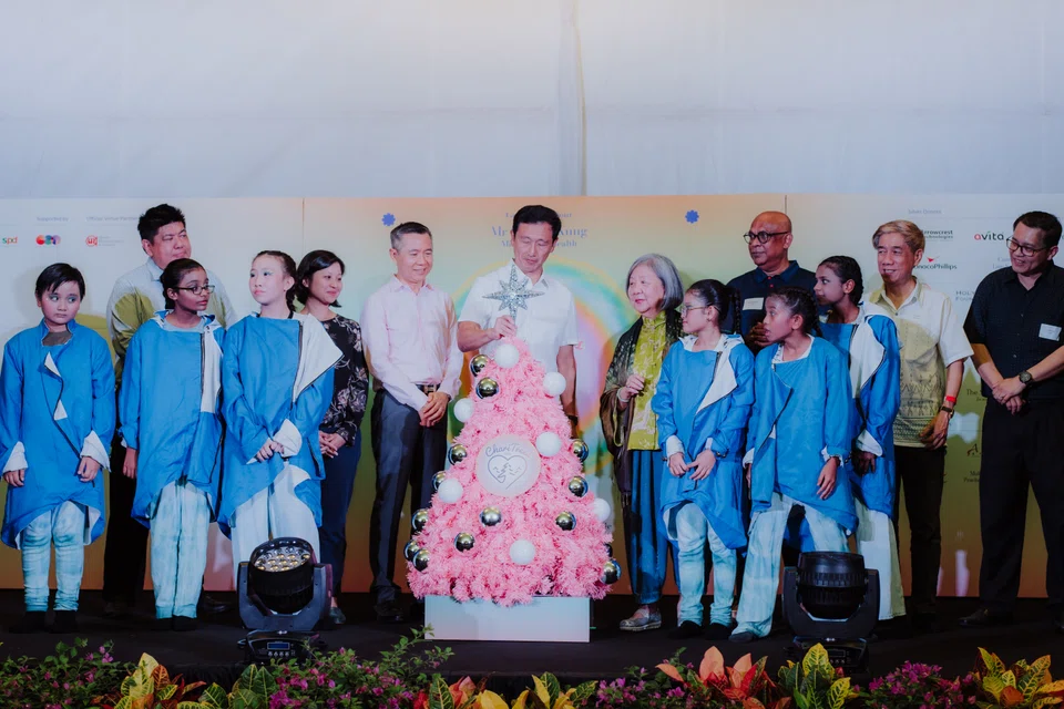 Minister for Health Ong Ye Kung (centre) at the ChariTrees light-up on Tuesday, where he was the guest of honour.