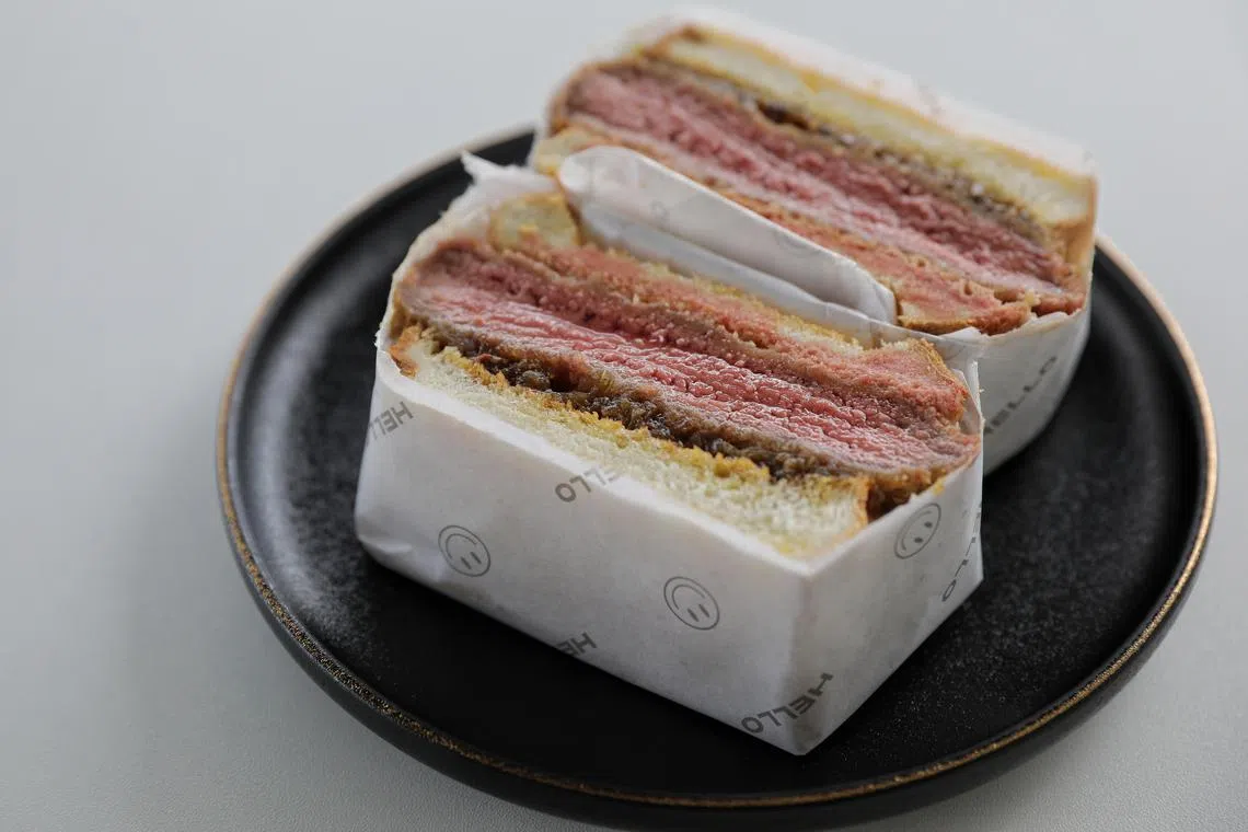 The wagyu katsu sando is the Porsche of sandwiches, with its luxurious combination of elite beef, ethereal milk bread slices, and a brush of tangy-sweet tare sauce.