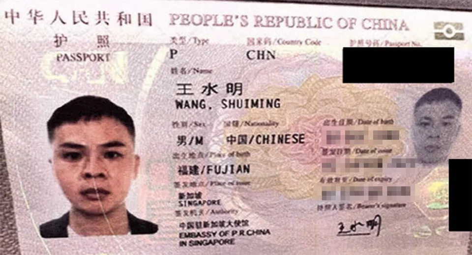 Vang Shuiming's passport from court documents. He was deported to Japan on Jun 1 last year, after he served his jail term in Singapore. 