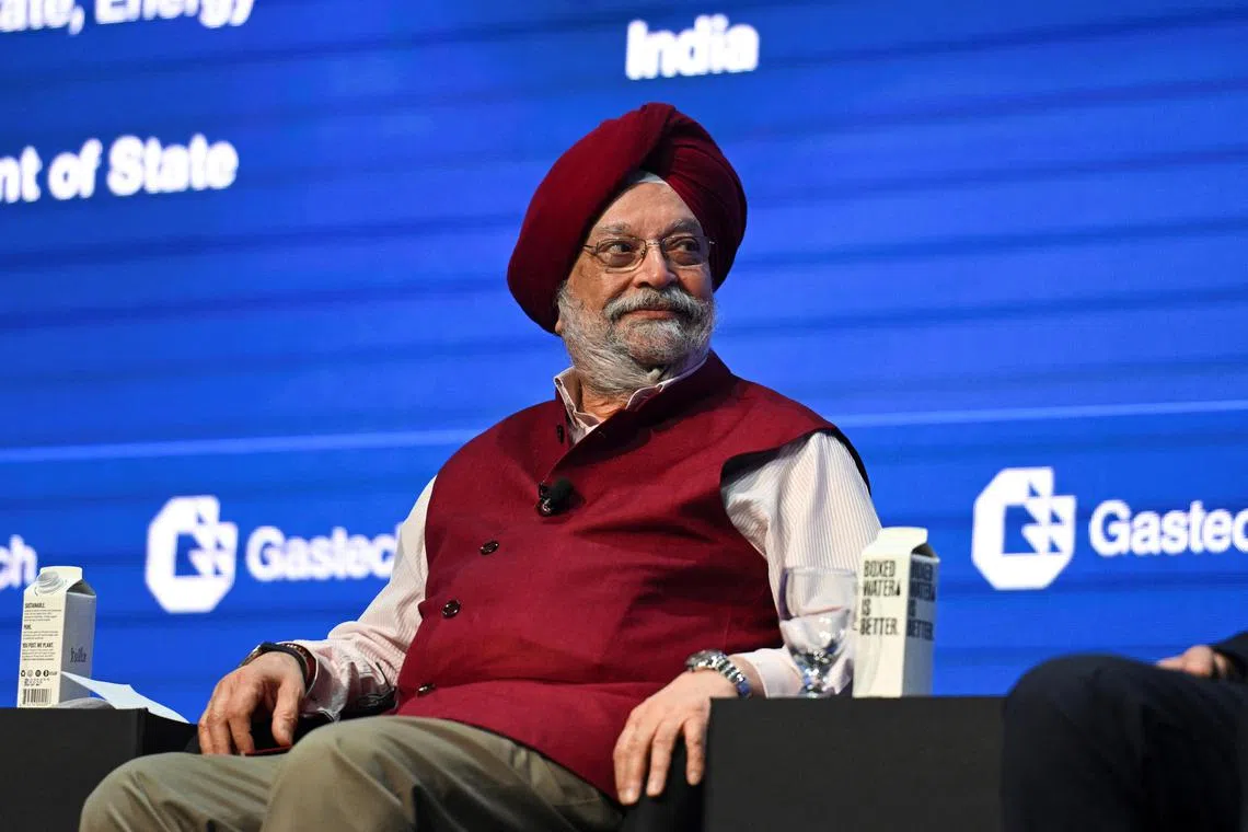 India's oil minister Hardeep Singh Puri says the country will buy oil from wherever its companies get the best rates.