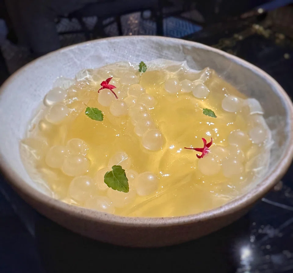 Lemongrass jelly in a ginger syrup is a refreshing dessert.