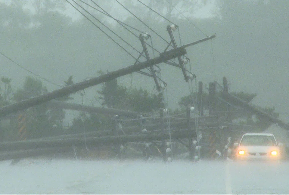 Power lines downed by the high winds from Typhoon Koinu in Taiwan's southern Pingtung County. Typhoon Koinu grazed the southern edge of Taiwan on Oct 5, blanketing the region in torrential rain.