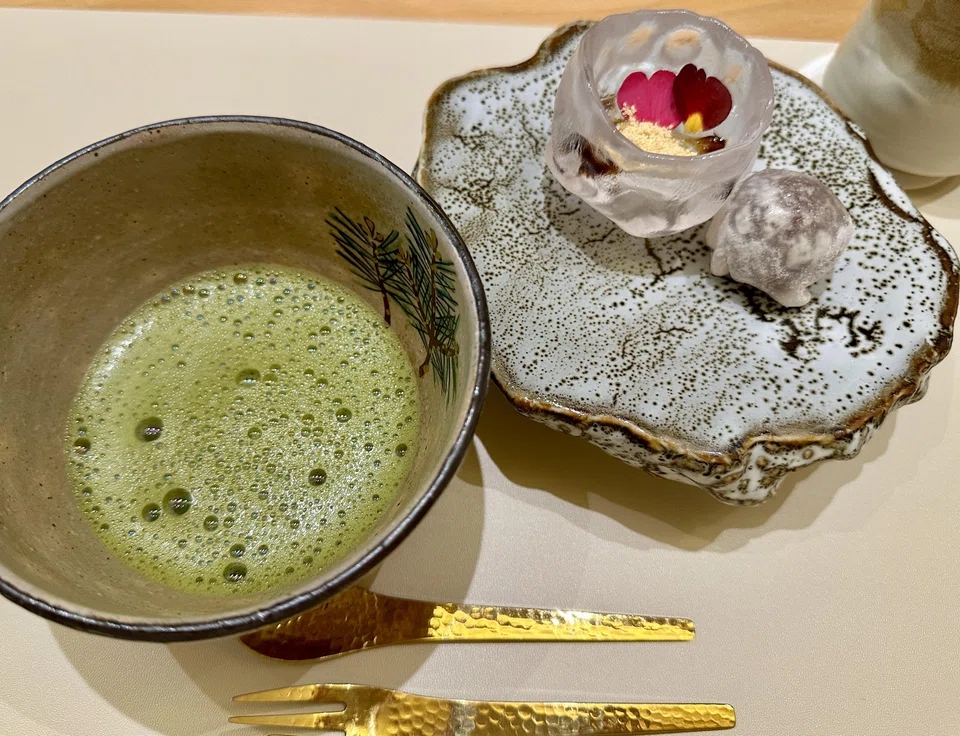 Dessert is served with matcha in a quickie tea ceremony.