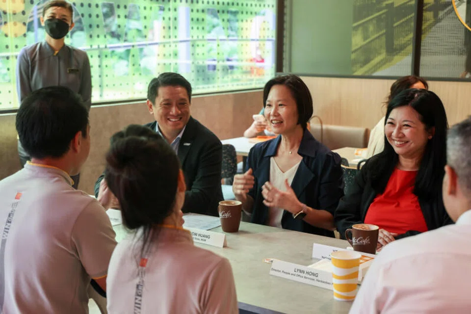 From left: Co-chairs of the tripartite workgroup Edwin Ng of SNEF; Minister of State for Manpower Gan Siow Huang; and Yeo Wan Ling of NTUC.
