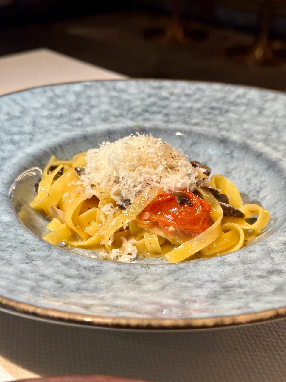Tagliatelle in fermented mushroom sauce.