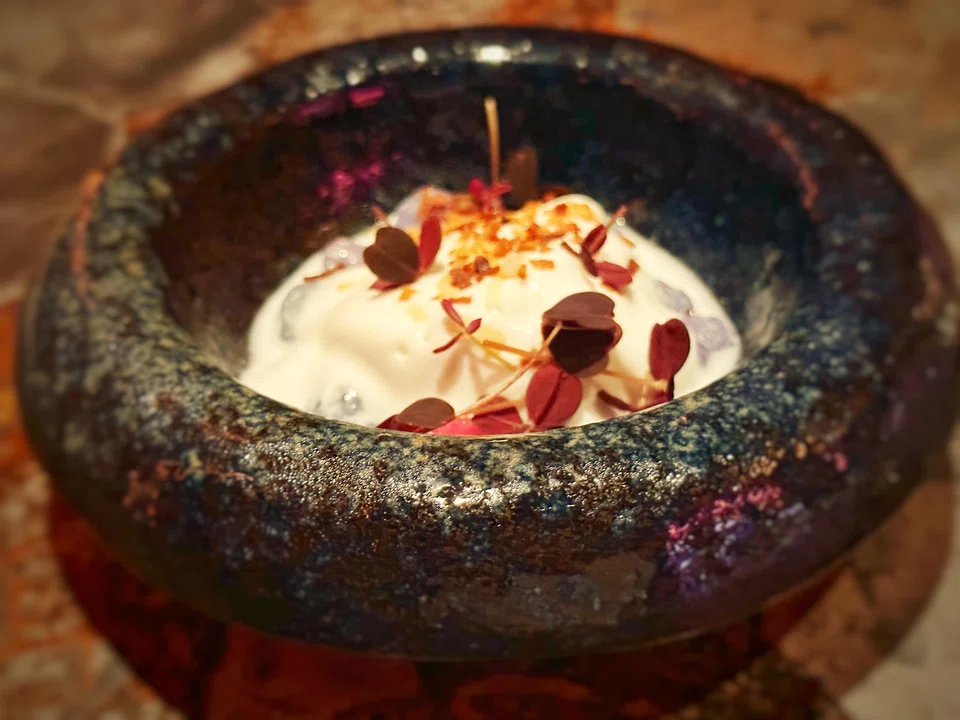 Blue-hued jellied waterchestnut and coconut ice cream makes a disappointing dessert.