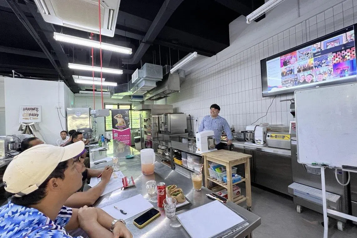 A session on menu engineering and cost management at Excelerate.sg’s training kitchen. Beyond acquiring operational skills, workshop participants will learn to develop unique business models.