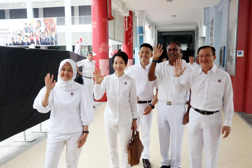 The PAP team in the newly formed Jurong East-Bukit Batok GRC, led by Minister for Sustainability and Environment Grace Fu (second from left), clinched 99,345 of 129,593 valid votes. 