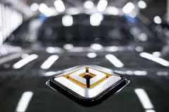 The pact provides Rivian with a much-needed source of fresh capital after the company struggled to ramp up production and deliveries.